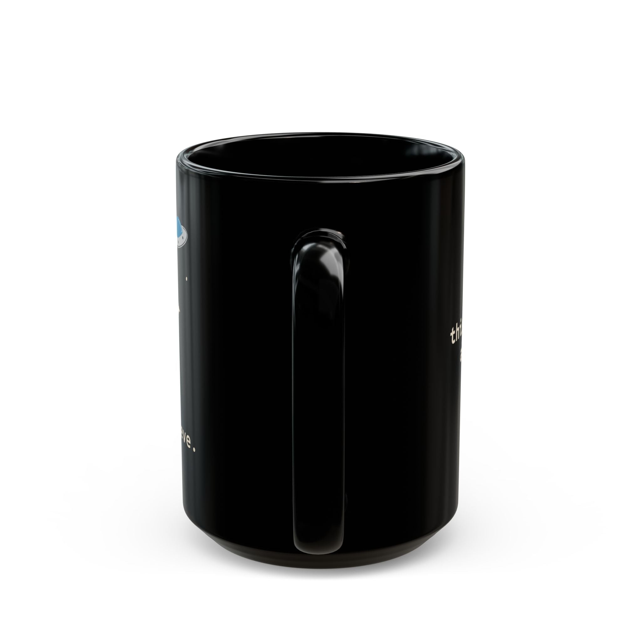 Alien Sitting on Rock Black Mug — “free to believe.” 11oz & 15oz