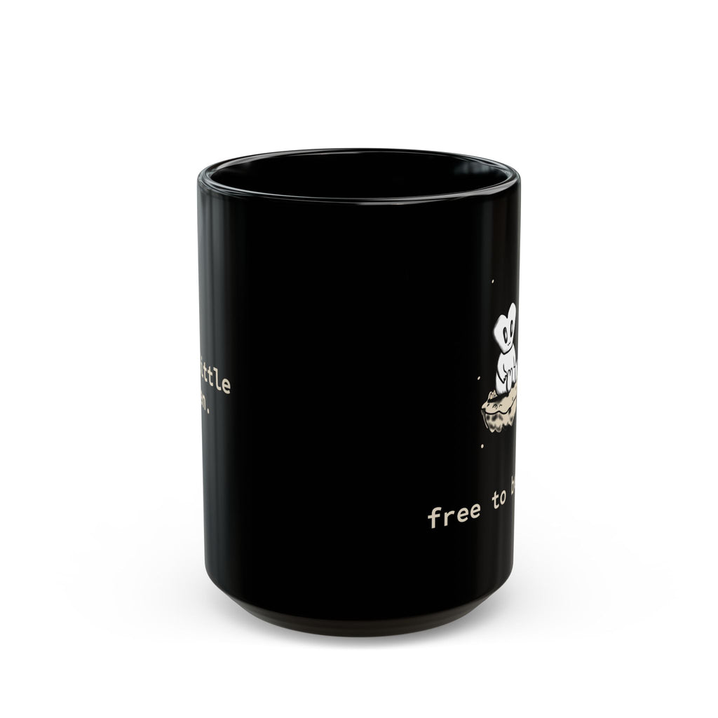 Alien Sitting on Rock Black Mug — “free to believe.” 11oz & 15oz